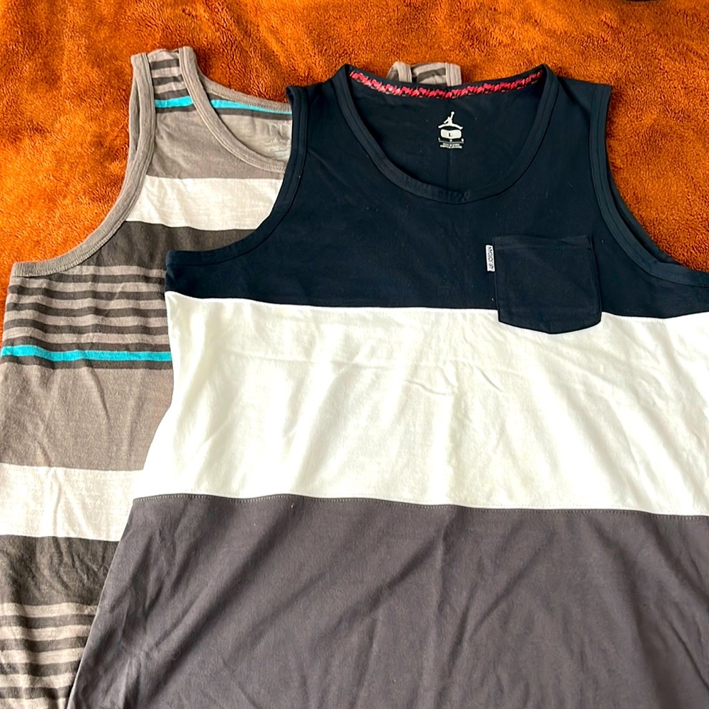 Men’s tanks. Size large, good condition.